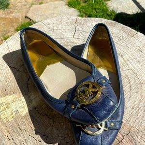 Michael Kors Navy Flats, Golden Logo Size 9. Good condition.